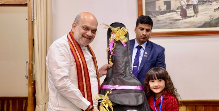 Amit Shah gifts guitar to child prodigy from Mizoram