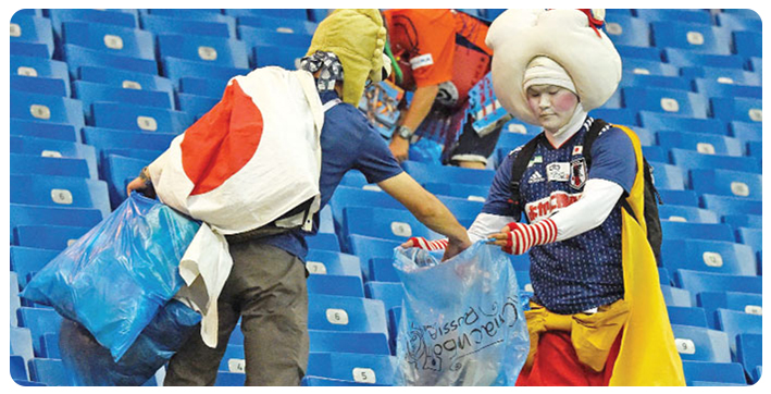 fifa-world-cup-2022-japanese-fans-stay-behind-to-clean-up-stadium