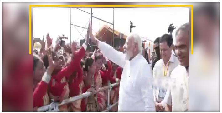 pm-modi-breaks-protocol-steps-down-from-stage-greets-people-at-dibrugarh-rally