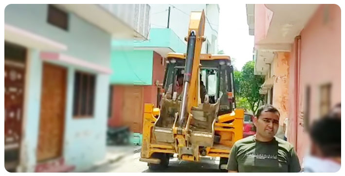 this-time-bulldozer-comes-to-the-rescue-of-a-bahu-in-up