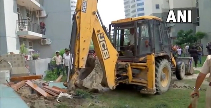 UP: Bulldozers Demolish Illegal Construction at Home Of Man Who Misbehaved With Woman at Noida Society