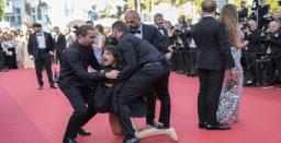 Woman Strips on Cannes Red Carpet to Protest Rapes in Ukraines