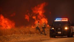 Hughes Fire Forces Over 50,000 Evacuations as Wildfires Rage Across Los Angeles Cou..