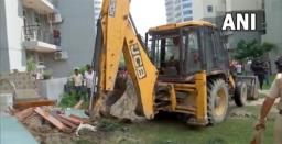 UP: Bulldozers Demolish Illegal Construction at Home Of Man Who Misbehaved With Wom..